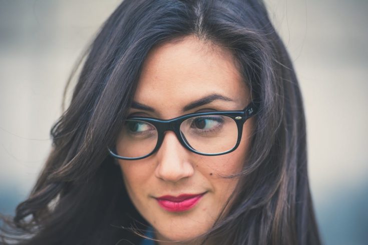 Pretty woman wearing eyeglasses photo